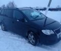 Черный Фольксваген Туран, объемом двигателя 1.9 л и пробегом 300 тыс. км за 8500 $, фото 1 на Automoto.ua