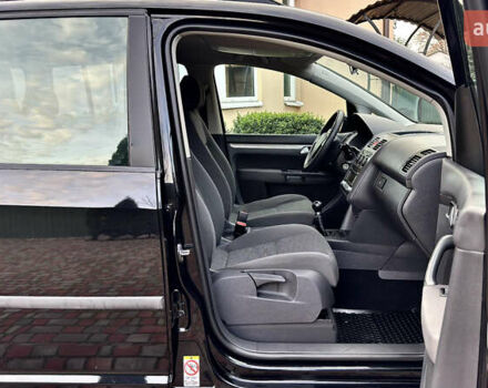 Черный Фольксваген Туран, объемом двигателя 1.6 л и пробегом 176 тыс. км за 8198 $, фото 46 на Automoto.ua