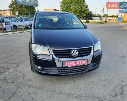 Черный Фольксваген Туран, объемом двигателя 1.6 л и пробегом 213 тыс. км за 8550 $, фото 37 на Automoto.ua