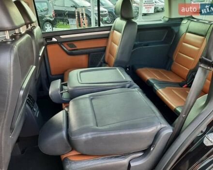 Черный Фольксваген Туран, объемом двигателя 1.6 л и пробегом 213 тыс. км за 8550 $, фото 91 на Automoto.ua