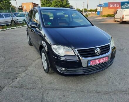 Черный Фольксваген Туран, объемом двигателя 1.6 л и пробегом 213 тыс. км за 8550 $, фото 1 на Automoto.ua