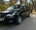 Чорний Фольксваген Туран, об'ємом двигуна 1.39 л та пробігом 262 тис. км за 6999 $, фото 1 на Automoto.ua