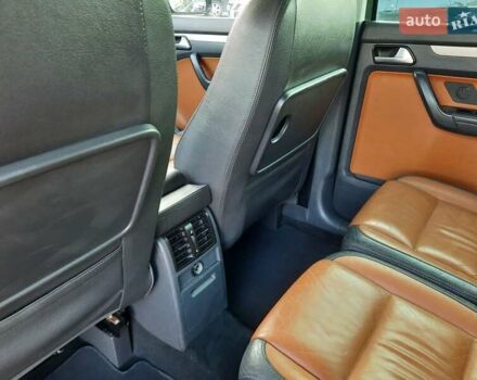 Черный Фольксваген Туран, объемом двигателя 1.6 л и пробегом 213 тыс. км за 8550 $, фото 84 на Automoto.ua