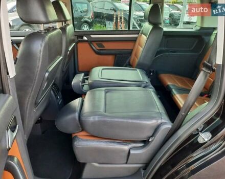 Черный Фольксваген Туран, объемом двигателя 1.6 л и пробегом 213 тыс. км за 8550 $, фото 90 на Automoto.ua