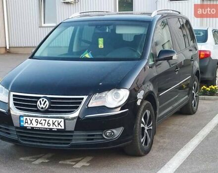 Чорний Фольксваген Туран, об'ємом двигуна 1.39 л та пробігом 220 тис. км за 6800 $, фото 1 на Automoto.ua