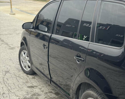 Черный Фольксваген Туран, объемом двигателя 1.4 л и пробегом 247 тыс. км за 7500 $, фото 6 на Automoto.ua