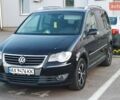 Чорний Фольксваген Туран, об'ємом двигуна 1.39 л та пробігом 220 тис. км за 6800 $, фото 1 на Automoto.ua