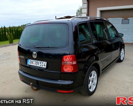 Черный Фольксваген Туран, объемом двигателя 2 л и пробегом 268 тыс. км за 2400 $, фото 3 на Automoto.ua