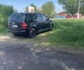 Чорний Фольксваген Туран, об'ємом двигуна 2 л та пробігом 290 тис. км за 2800 $, фото 1 на Automoto.ua