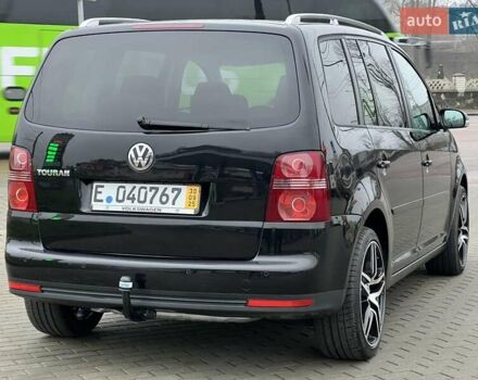 Чорний Фольксваген Туран, об'ємом двигуна 1.6 л та пробігом 147 тис. км за 8350 $, фото 5 на Automoto.ua