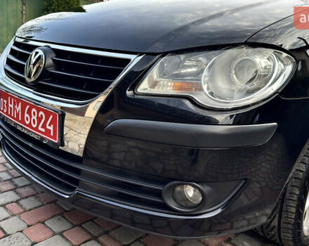 Черный Фольксваген Туран, объемом двигателя 1.6 л и пробегом 176 тыс. км за 8198 $, фото 91 на Automoto.ua