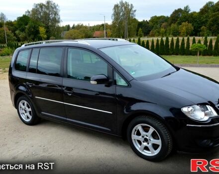 Черный Фольксваген Туран, объемом двигателя 2 л и пробегом 268 тыс. км за 2400 $, фото 5 на Automoto.ua