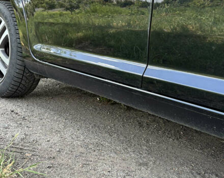 Черный Фольксваген Туран, объемом двигателя 1.39 л и пробегом 191 тыс. км за 8500 $, фото 4 на Automoto.ua