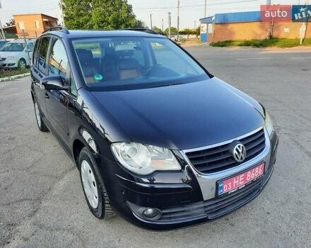 Черный Фольксваген Туран, объемом двигателя 1.6 л и пробегом 213 тыс. км за 8550 $, фото 152 на Automoto.ua