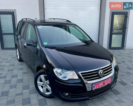 Чорний Фольксваген Туран, об'ємом двигуна 2 л та пробігом 292 тис. км за 8999 $, фото 10 на Automoto.ua