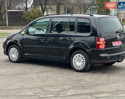 Черный Фольксваген Туран, объемом двигателя 1.6 л и пробегом 193 тыс. км за 7799 $, фото 21 на Automoto.ua