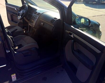 Черный Фольксваген Туран, объемом двигателя 1.4 л и пробегом 291 тыс. км за 6050 $, фото 7 на Automoto.ua