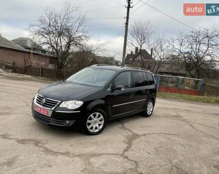 Черный Фольксваген Туран, объемом двигателя 1.4 л и пробегом 194 тыс. км за 6555 $, фото 29 на Automoto.ua