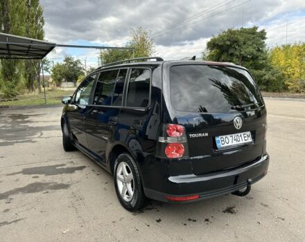 Черный Фольксваген Туран, объемом двигателя 1.4 л и пробегом 237 тыс. км за 6850 $, фото 3 на Automoto.ua