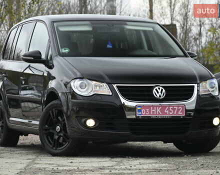 Черный Фольксваген Туран, объемом двигателя 1.6 л и пробегом 152 тыс. км за 7600 $, фото 1 на Automoto.ua