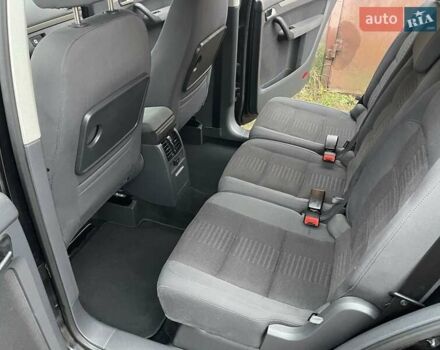 Черный Фольксваген Туран, объемом двигателя 1.4 л и пробегом 194 тыс. км за 6555 $, фото 122 на Automoto.ua