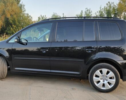 Черный Фольксваген Туран, объемом двигателя 1.4 л и пробегом 200 тыс. км за 6900 $, фото 3 на Automoto.ua