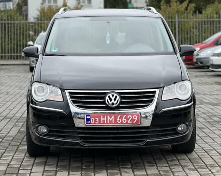 Черный Фольксваген Туран, объемом двигателя 1.4 л и пробегом 195 тыс. км за 7600 $, фото 1 на Automoto.ua