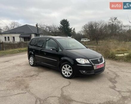 Черный Фольксваген Туран, объемом двигателя 1.4 л и пробегом 194 тыс. км за 6555 $, фото 78 на Automoto.ua