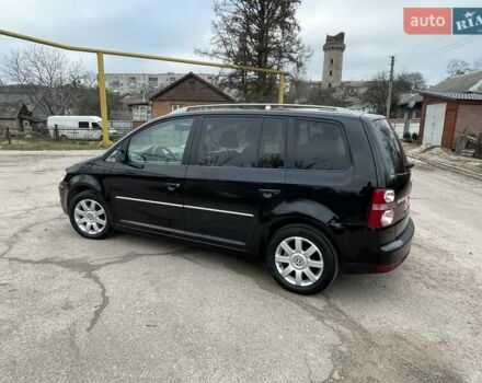 Черный Фольксваген Туран, объемом двигателя 1.4 л и пробегом 194 тыс. км за 6555 $, фото 33 на Automoto.ua