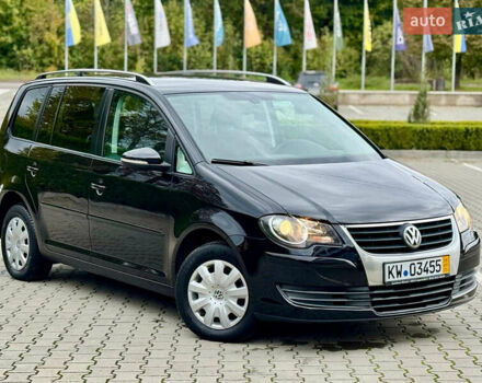 Черный Фольксваген Туран, объемом двигателя 1.4 л и пробегом 190 тыс. км за 7200 $, фото 2 на Automoto.ua