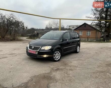 Черный Фольксваген Туран, объемом двигателя 1.4 л и пробегом 194 тыс. км за 6555 $, фото 100 на Automoto.ua