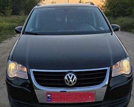 Черный Фольксваген Туран, объемом двигателя 1.4 л и пробегом 194 тыс. км за 7600 $, фото 5 на Automoto.ua