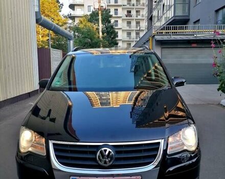 Черный Фольксваген Туран, объемом двигателя 1.4 л и пробегом 193 тыс. км за 6600 $, фото 4 на Automoto.ua