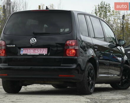 Черный Фольксваген Туран, объемом двигателя 1.6 л и пробегом 152 тыс. км за 7600 $, фото 11 на Automoto.ua
