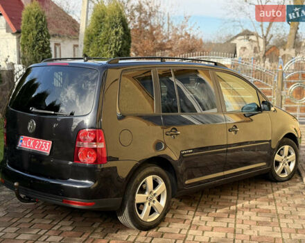 Чорний Фольксваген Туран, об'ємом двигуна 1.4 л та пробігом 148 тис. км за 5999 $, фото 30 на Automoto.ua