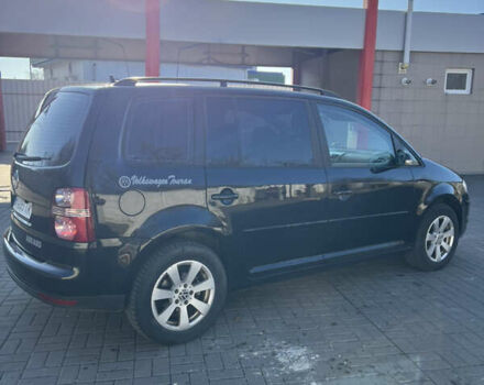 Черный Фольксваген Туран, объемом двигателя 1.9 л и пробегом 353 тыс. км за 6699 $, фото 12 на Automoto.ua