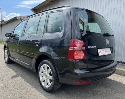 Черный Фольксваген Туран, объемом двигателя 1.4 л и пробегом 203 тыс. км за 6550 $, фото 6 на Automoto.ua
