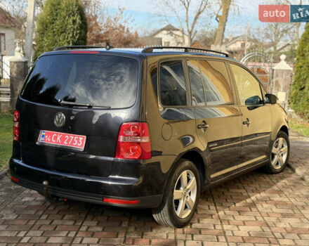 Чорний Фольксваген Туран, об'ємом двигуна 1.4 л та пробігом 148 тис. км за 5999 $, фото 25 на Automoto.ua