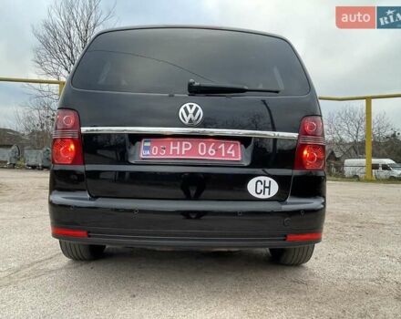 Черный Фольксваген Туран, объемом двигателя 1.4 л и пробегом 194 тыс. км за 6555 $, фото 28 на Automoto.ua