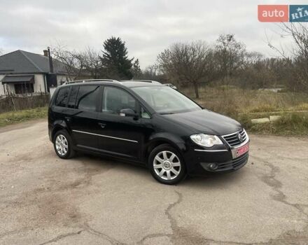 Черный Фольксваген Туран, объемом двигателя 1.4 л и пробегом 194 тыс. км за 6555 $, фото 79 на Automoto.ua