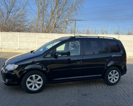 Черный Фольксваген Туран, объемом двигателя 1.9 л и пробегом 353 тыс. км за 6699 $, фото 4 на Automoto.ua