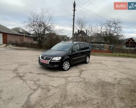 Черный Фольксваген Туран, объемом двигателя 1.4 л и пробегом 194 тыс. км за 6555 $, фото 13 на Automoto.ua