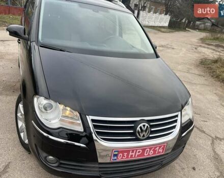 Черный Фольксваген Туран, объемом двигателя 1.4 л и пробегом 194 тыс. км за 6555 $, фото 80 на Automoto.ua