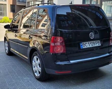 Черный Фольксваген Туран, объемом двигателя 1.97 л и пробегом 248 тыс. км за 8300 $, фото 4 на Automoto.ua