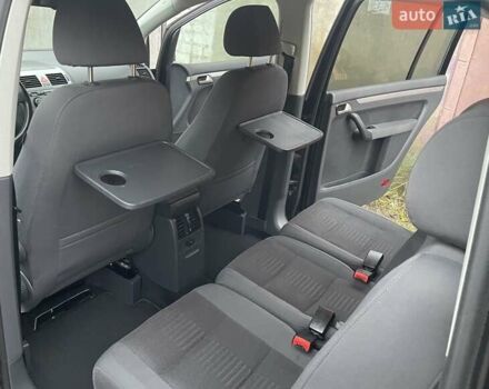 Черный Фольксваген Туран, объемом двигателя 1.4 л и пробегом 194 тыс. км за 6555 $, фото 116 на Automoto.ua