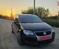 Черный Фольксваген Туран, объемом двигателя 1.4 л и пробегом 194 тыс. км за 7600 $, фото 2 на Automoto.ua