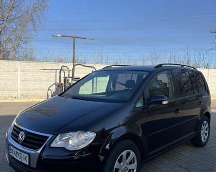 Черный Фольксваген Туран, объемом двигателя 1.9 л и пробегом 353 тыс. км за 6699 $, фото 2 на Automoto.ua
