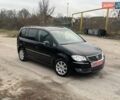 Черный Фольксваген Туран, объемом двигателя 1.4 л и пробегом 194 тыс. км за 6555 $, фото 188 на Automoto.ua