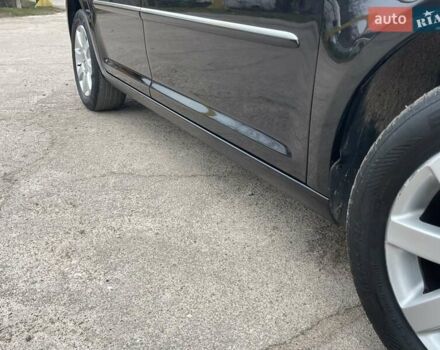 Черный Фольксваген Туран, объемом двигателя 1.4 л и пробегом 194 тыс. км за 6555 $, фото 177 на Automoto.ua