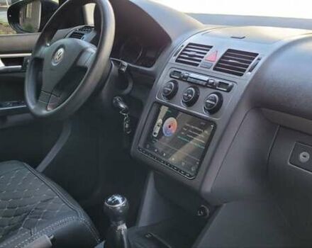 Черный Фольксваген Туран, объемом двигателя 1.97 л и пробегом 248 тыс. км за 8300 $, фото 18 на Automoto.ua